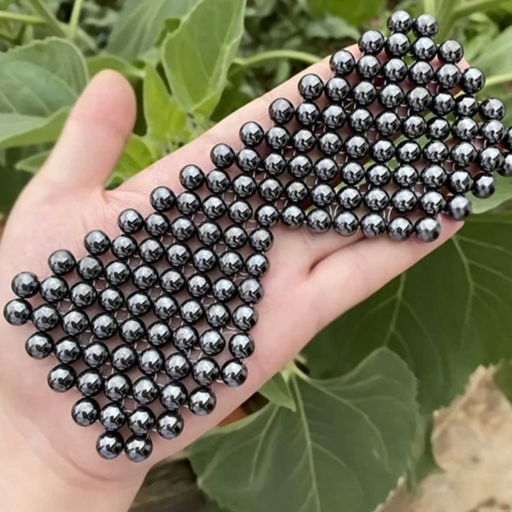 Hand woven Hematite Eye mask.